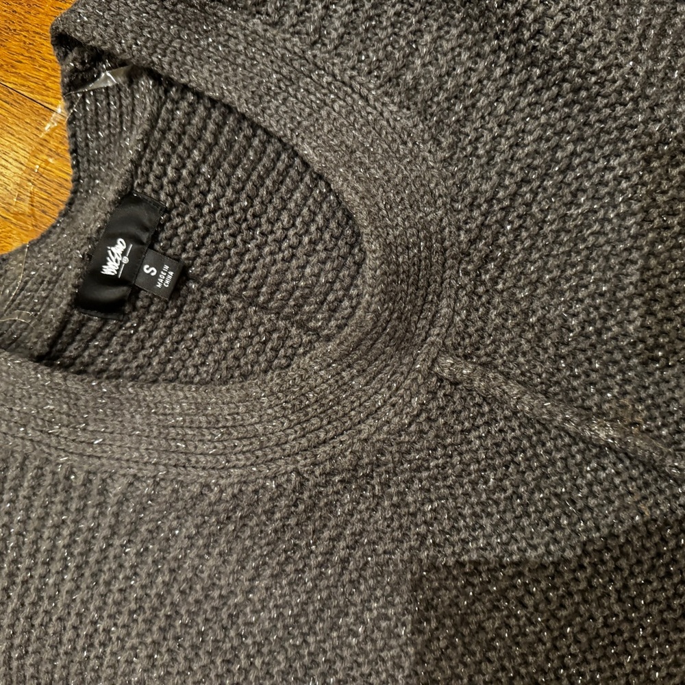 Women’s grey and silver sweater